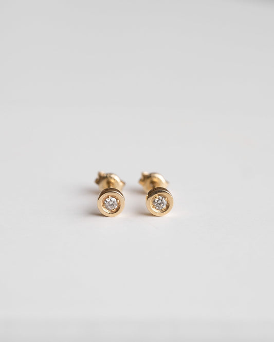 gold studs with small diamond 