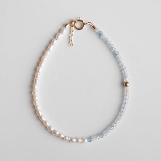 gold bracelet with pearls and aquamarine