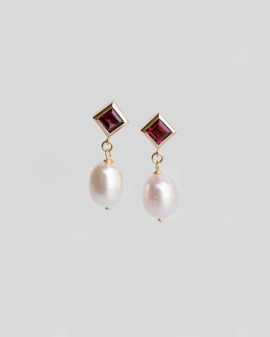pair of gold drop earrings with garnet and freshwater pearls