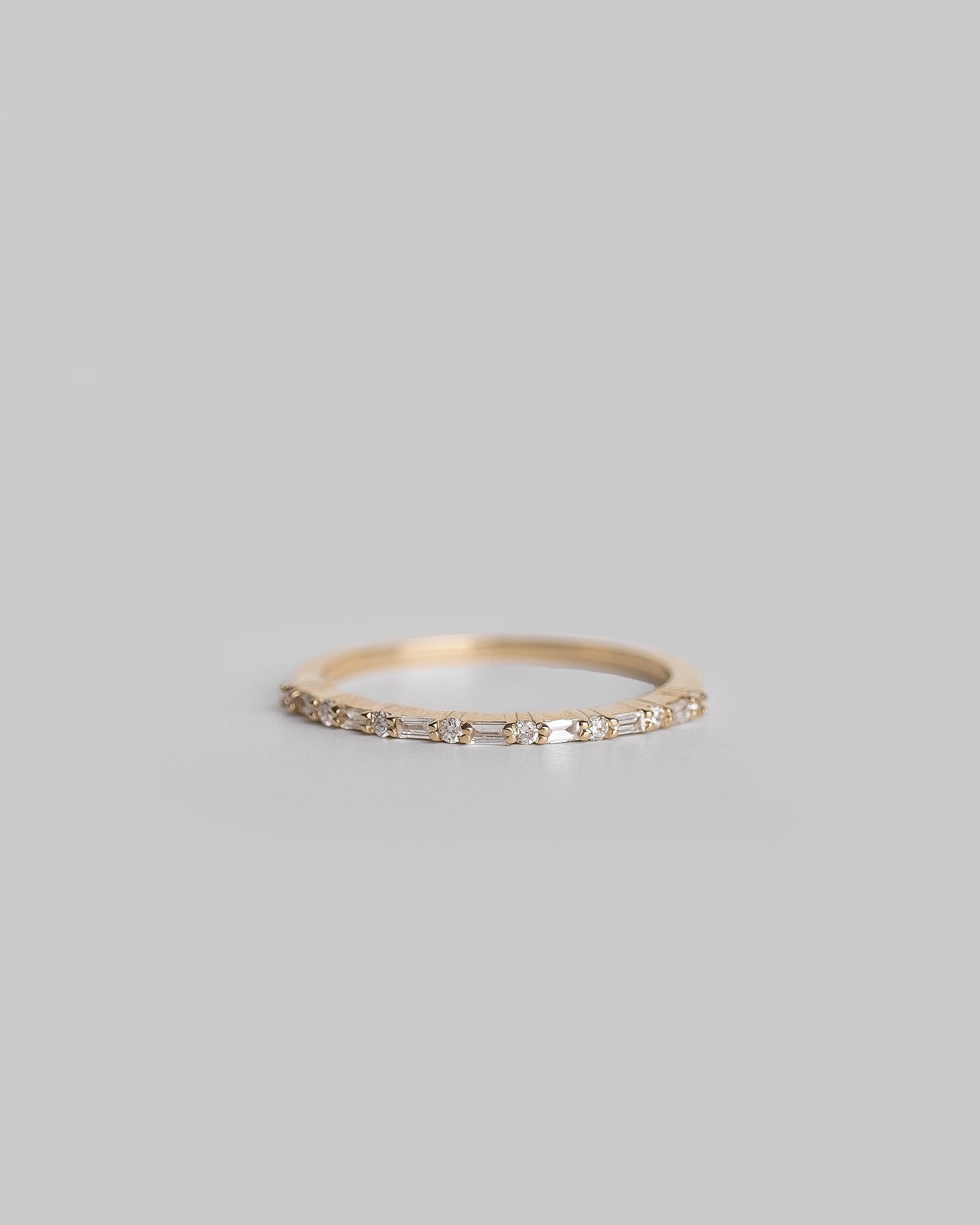 gold ring half eternity round and baguette cut diamond band 