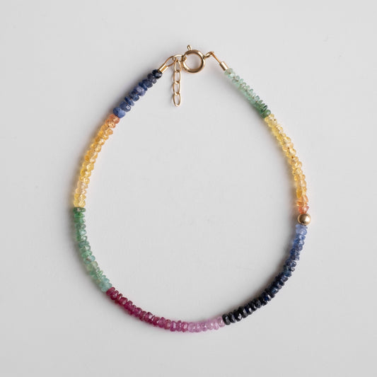 multicolored beaded bracelet with a gold clasp