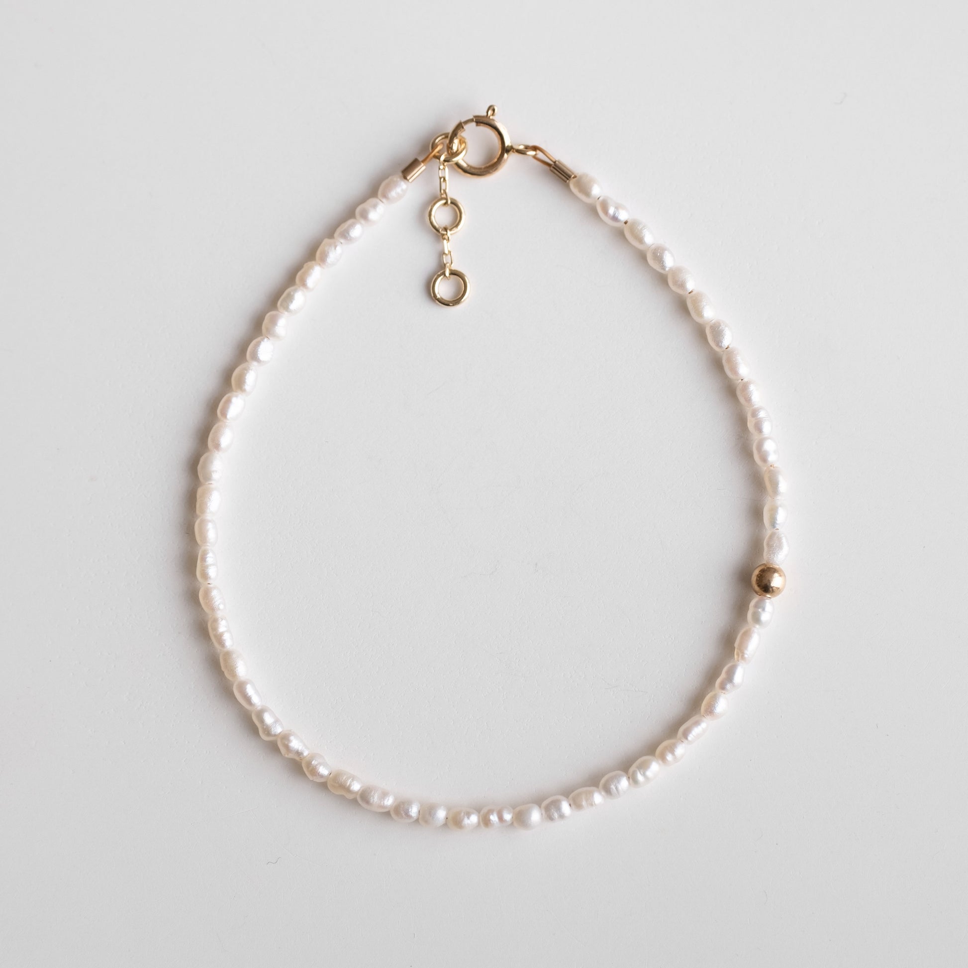 delicate pearl gold bracelet 