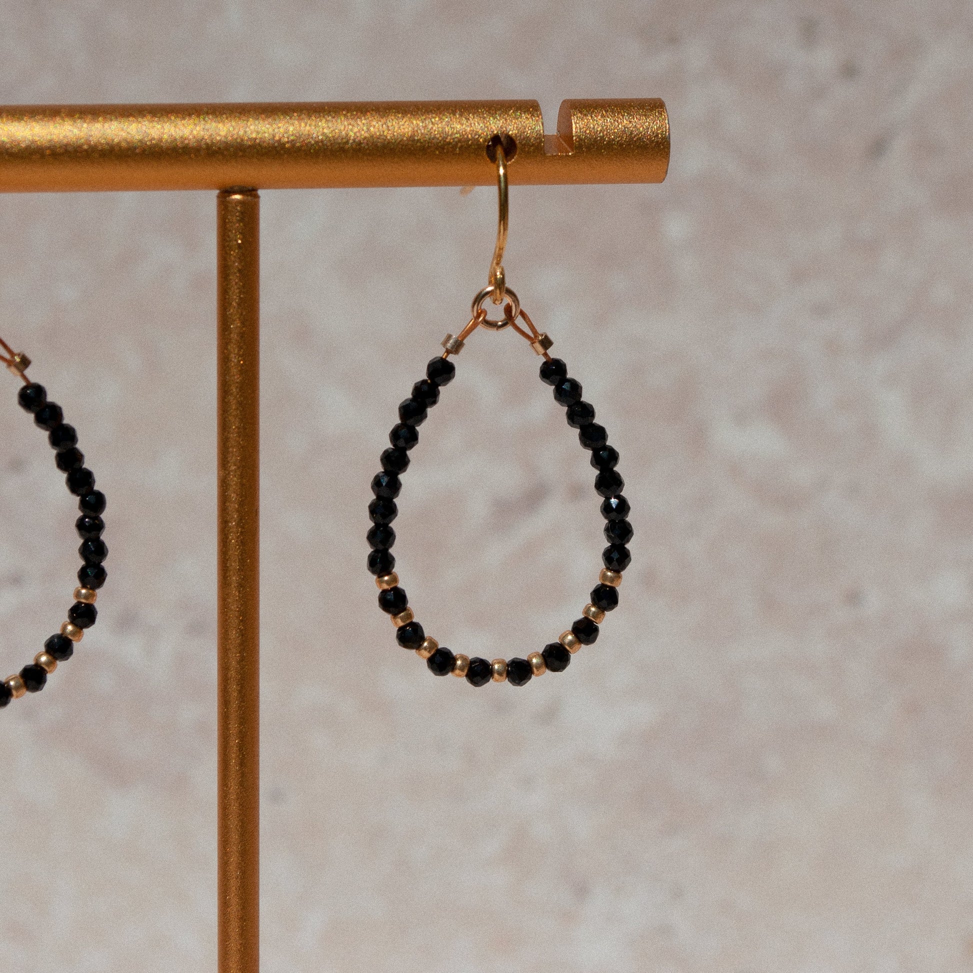 gold vermeil earrings with black spinel and gold plated beads