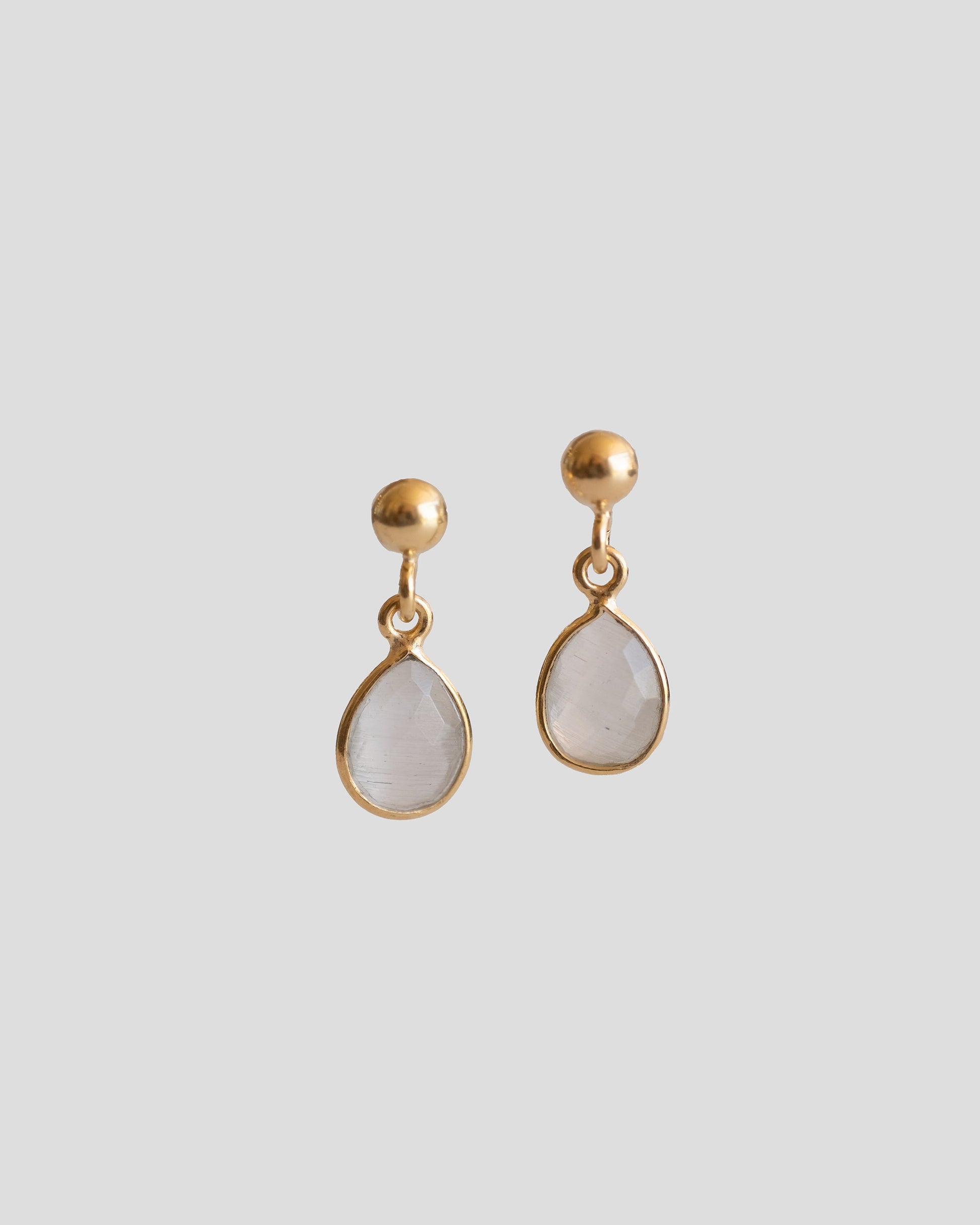 gentle gold vermeil drop earrings with light grey quartz and gold plated ball 